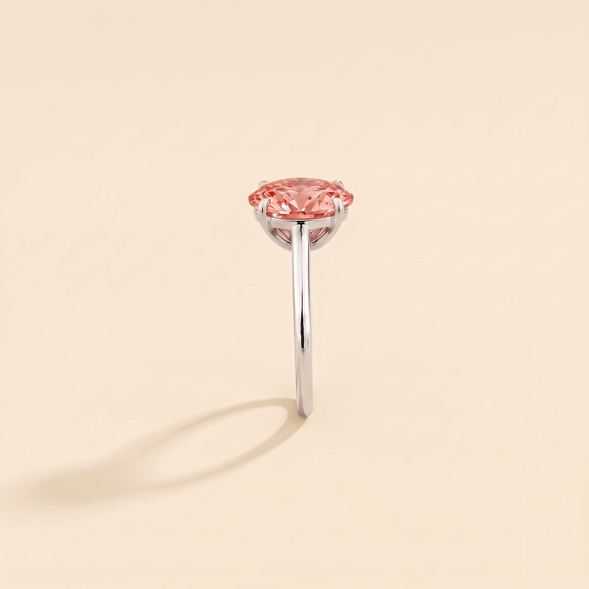 Lyra Oval Shape Padparadscha Sapphire Cathedral Solitaire Ring side edge