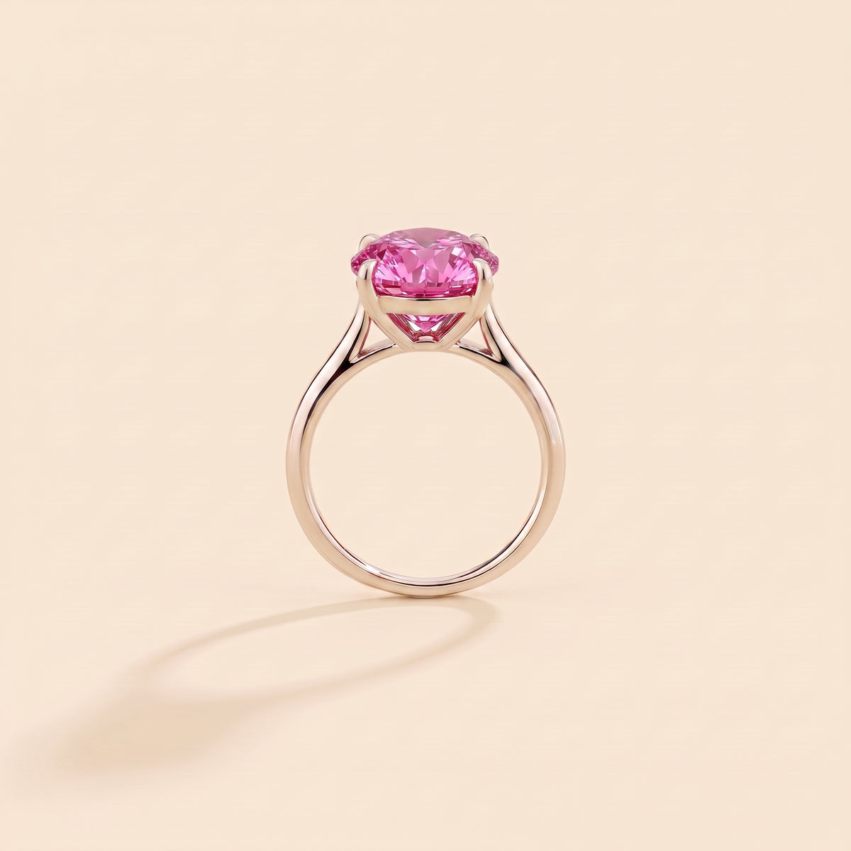 Iris Cushion Shape Vivid Pink Sapphire Cathedral Solitaire Ring side profile