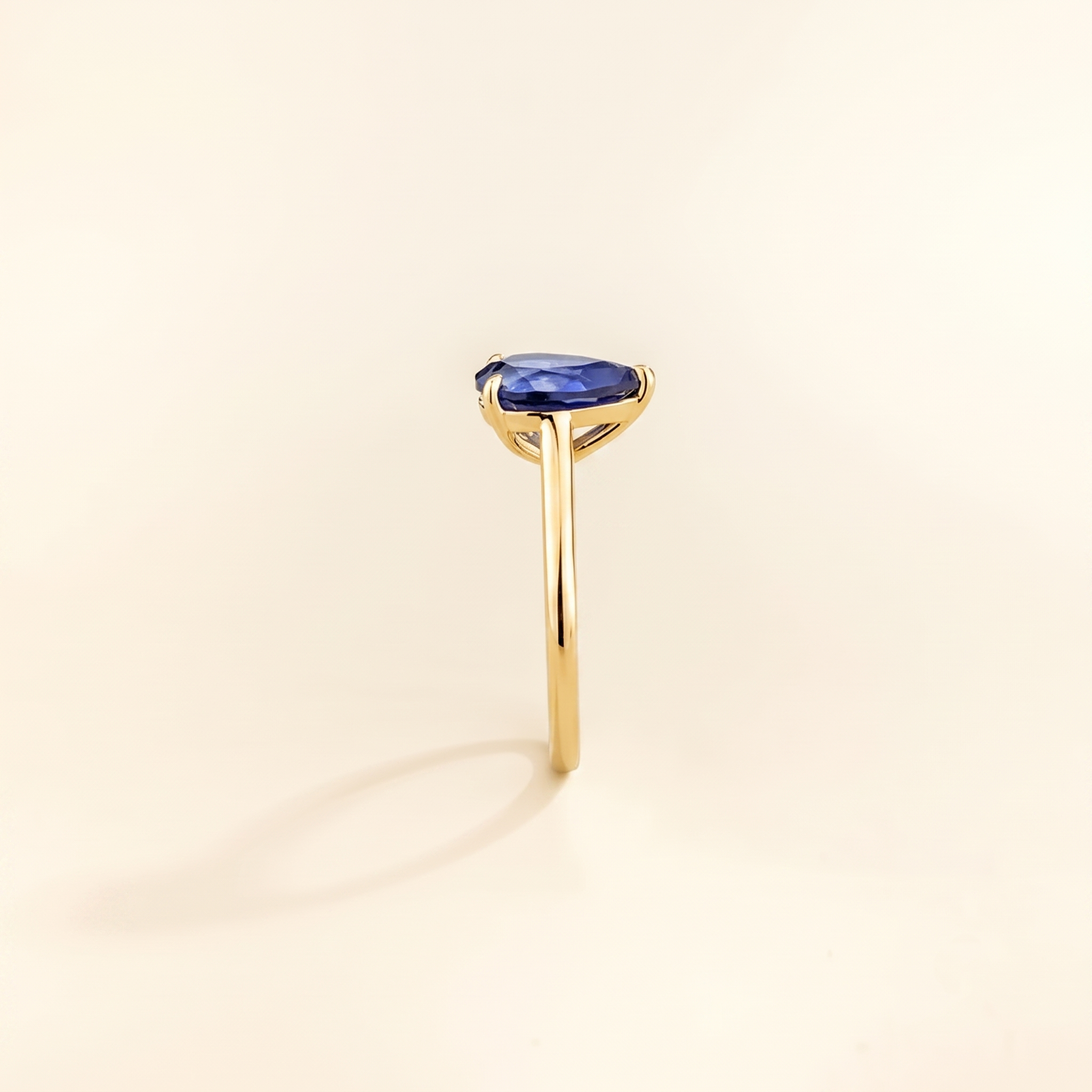 Pandal Pear Shape Blue Sapphire Cathedral Solitaire Ring side edge