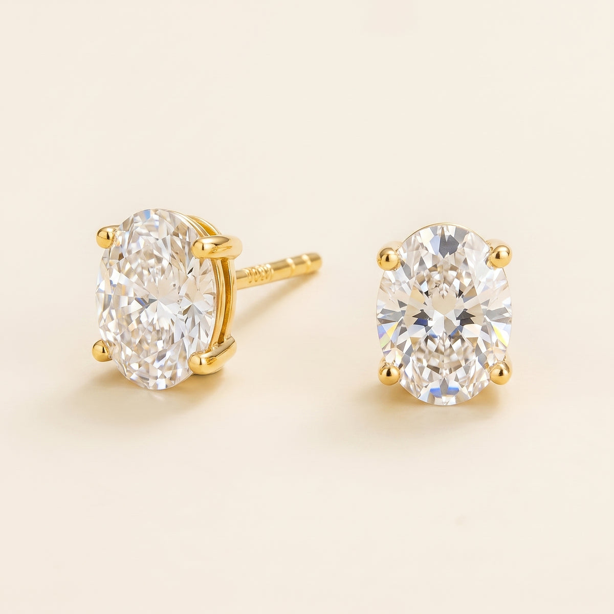 Ovo Diamond Oval Stud Earrings in  Gold – angle view