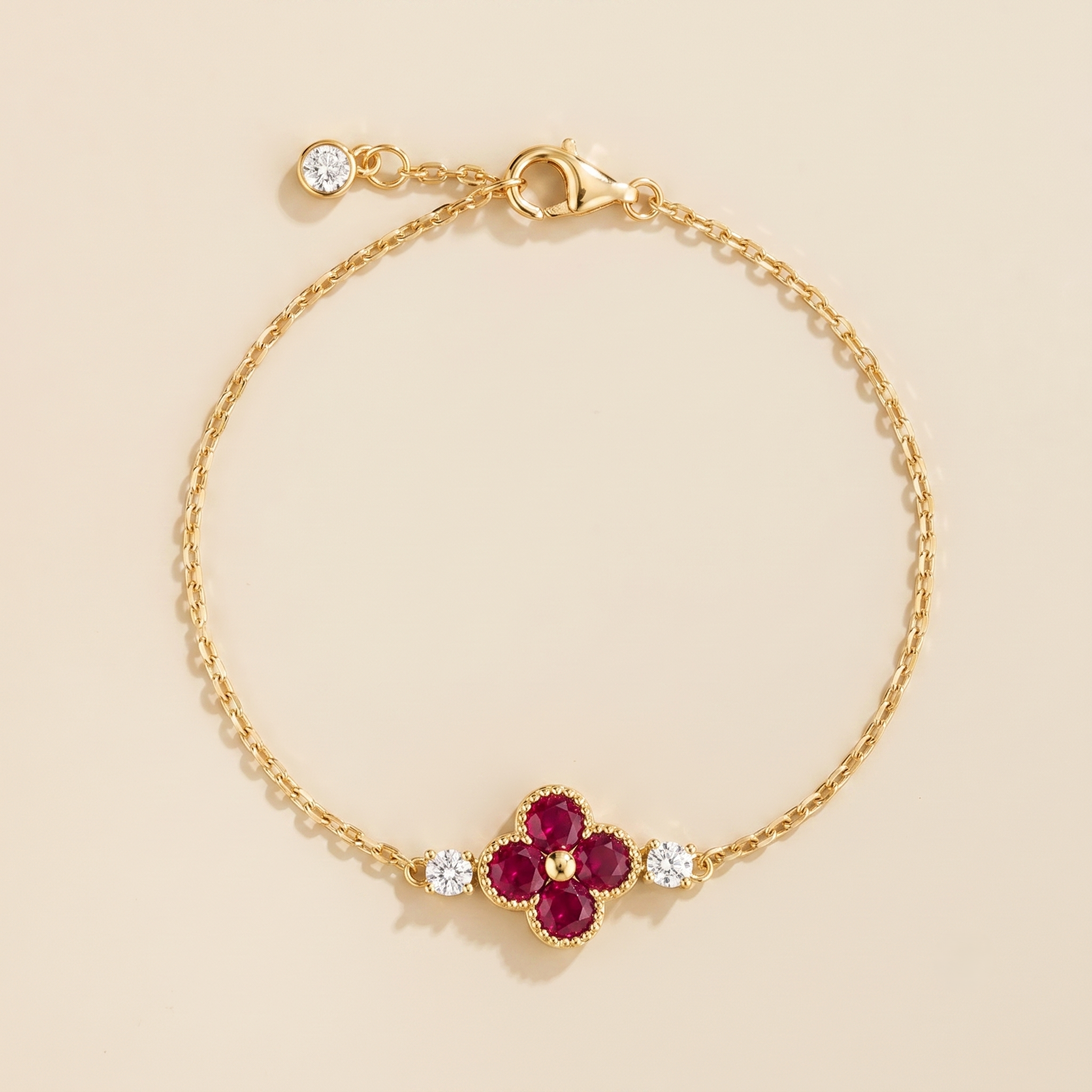 Lab-grown Ruby and diamond four-leaf clover chain bracelet in gold 
| Juvetti London