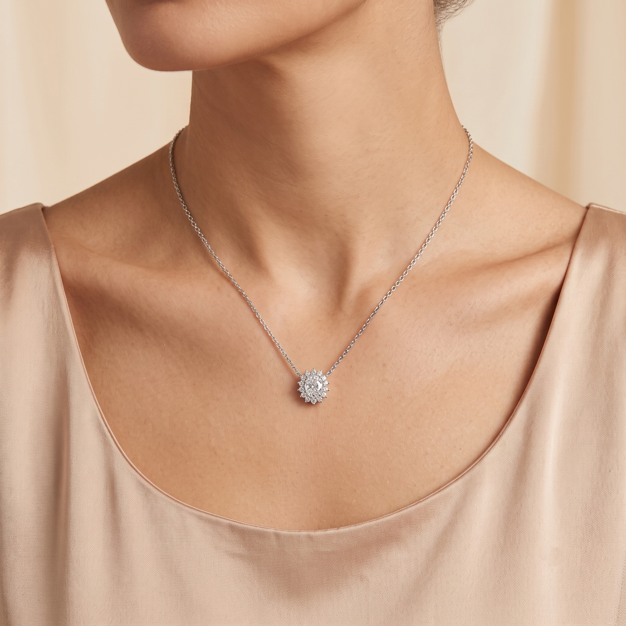 A model is wearing Divo Diamond Halo White Gold Necklace by Juvetti London