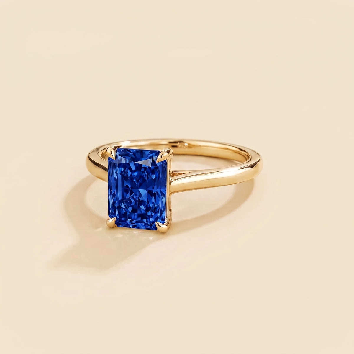 Clair Radiant Shape Blue Sapphire Cathedral Solitaire Ring three quarter