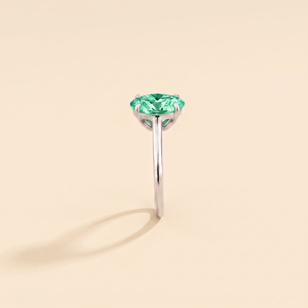 Lyra Oval Shape Green Sapphire Cathedral Solitaire Ring side edge