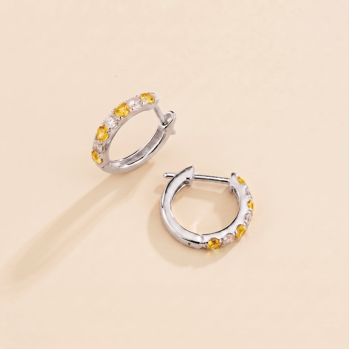 Stacy Yellow Sapphire & Diamond Huggie Hoop Earrings in white Gold | Juvetti
