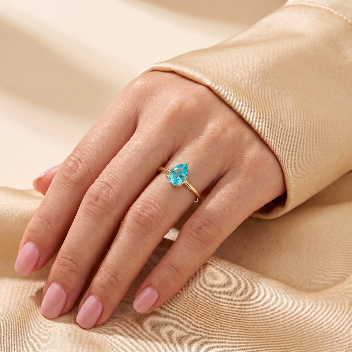 A model is wearing Pandal Pear Shape Paraiba Cathedral Solitaire Ring
