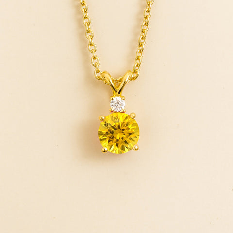 Emerald Earrings Juvetti Jewellery London Joie Pendant Necklace in Yellow Sapphire and Diamond Set In Gold