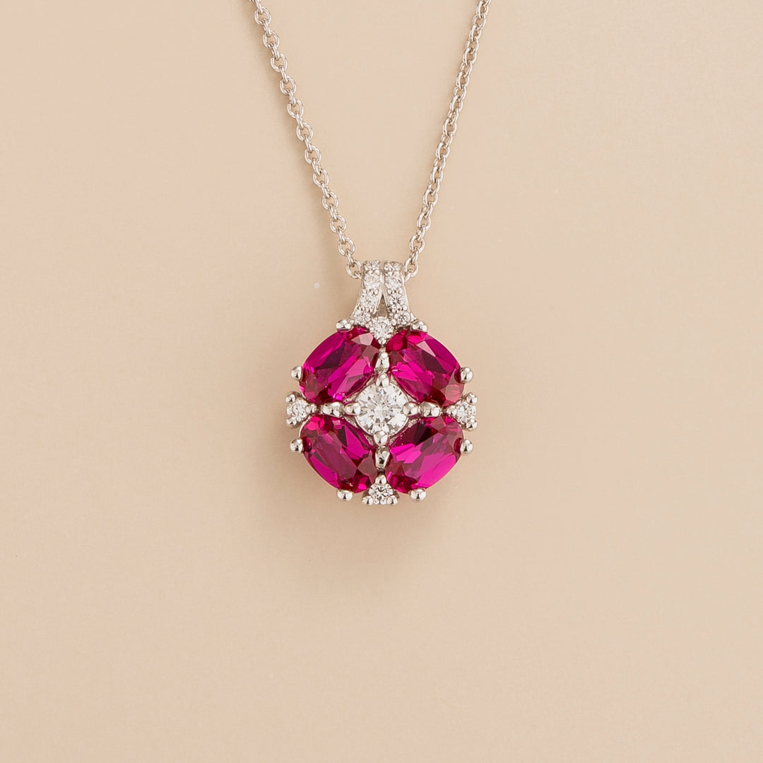 Pristi pendant necklace in 18K white gold vermeil set with lab grown Diamond and oval cut Ruby gem stones.