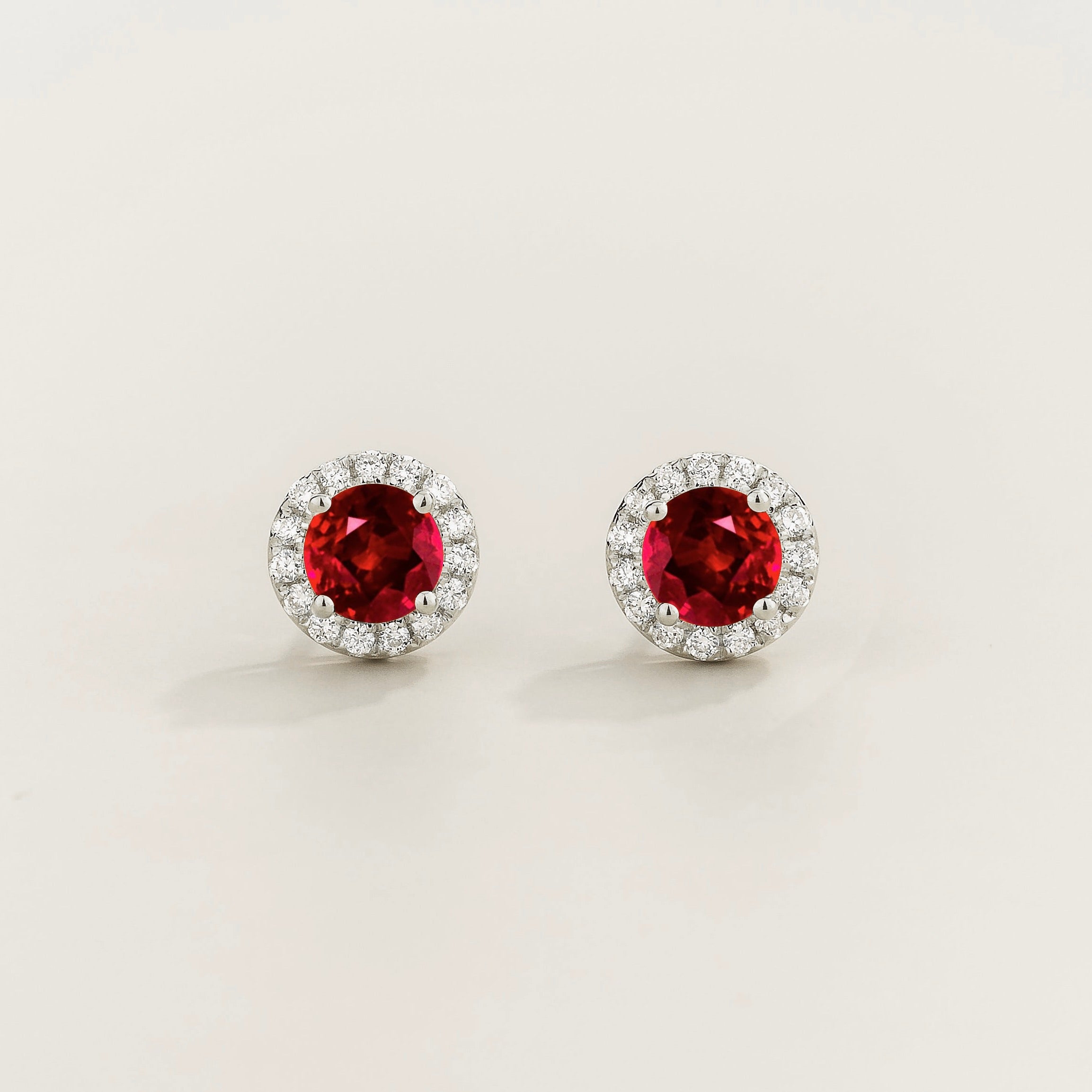 Mars Ruby Round & Diamond Halo Earrings In White Gold