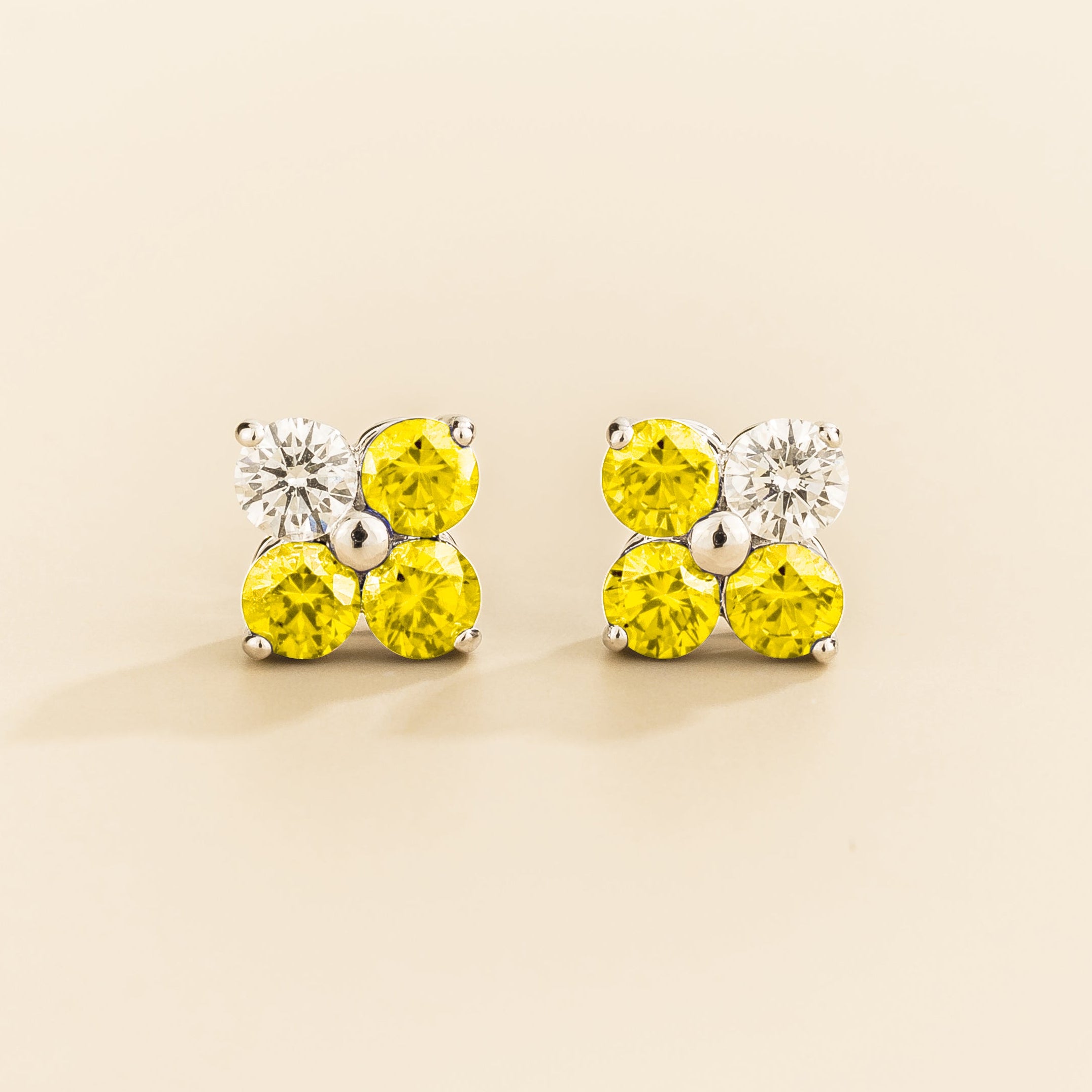 Pair of 4 gemstones yellow sapphire and diamond earrings in white gold