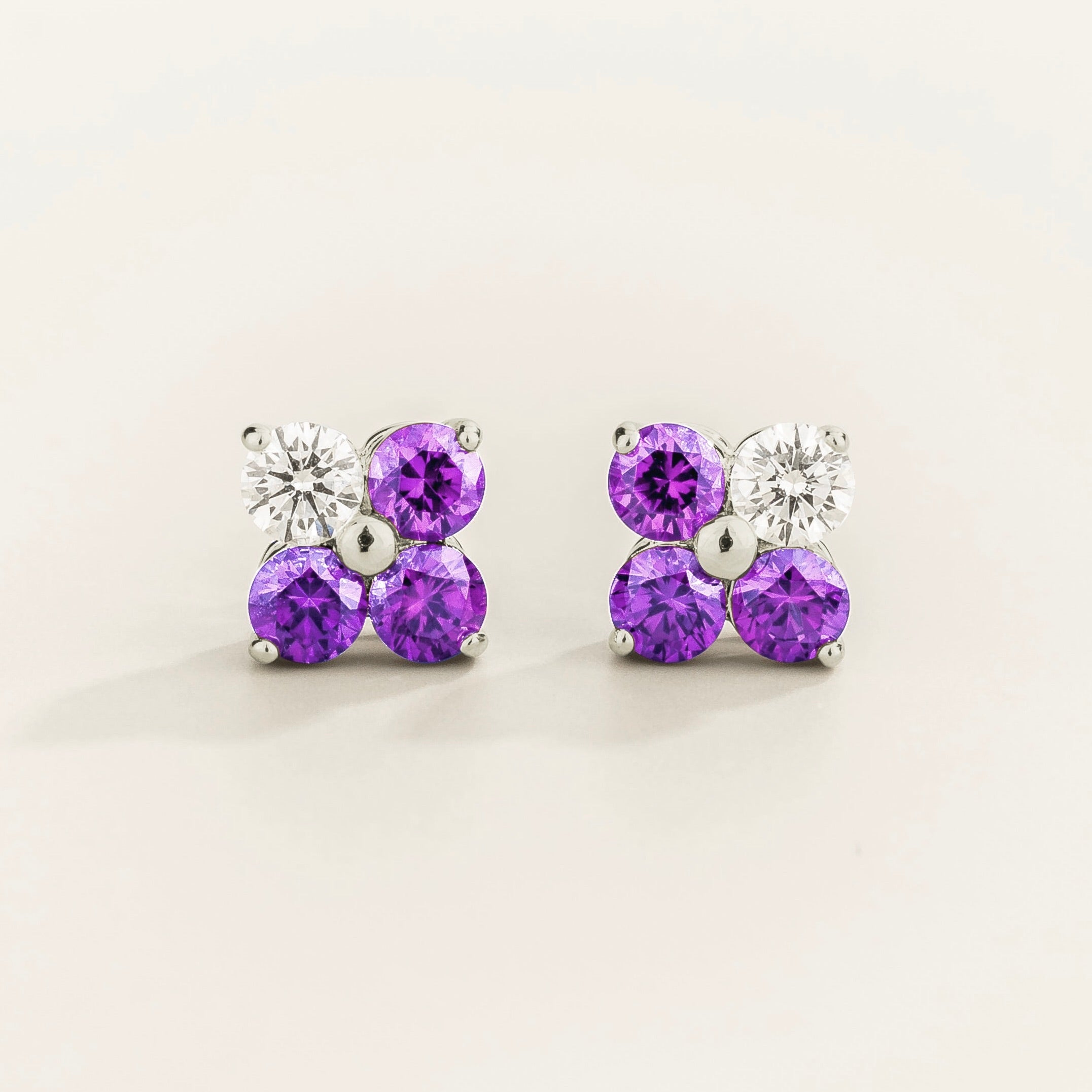 Petale 4-gemstones stud earrings in white gold set with ~0.7 carats purple sapphires and ~0.2 Diamonds