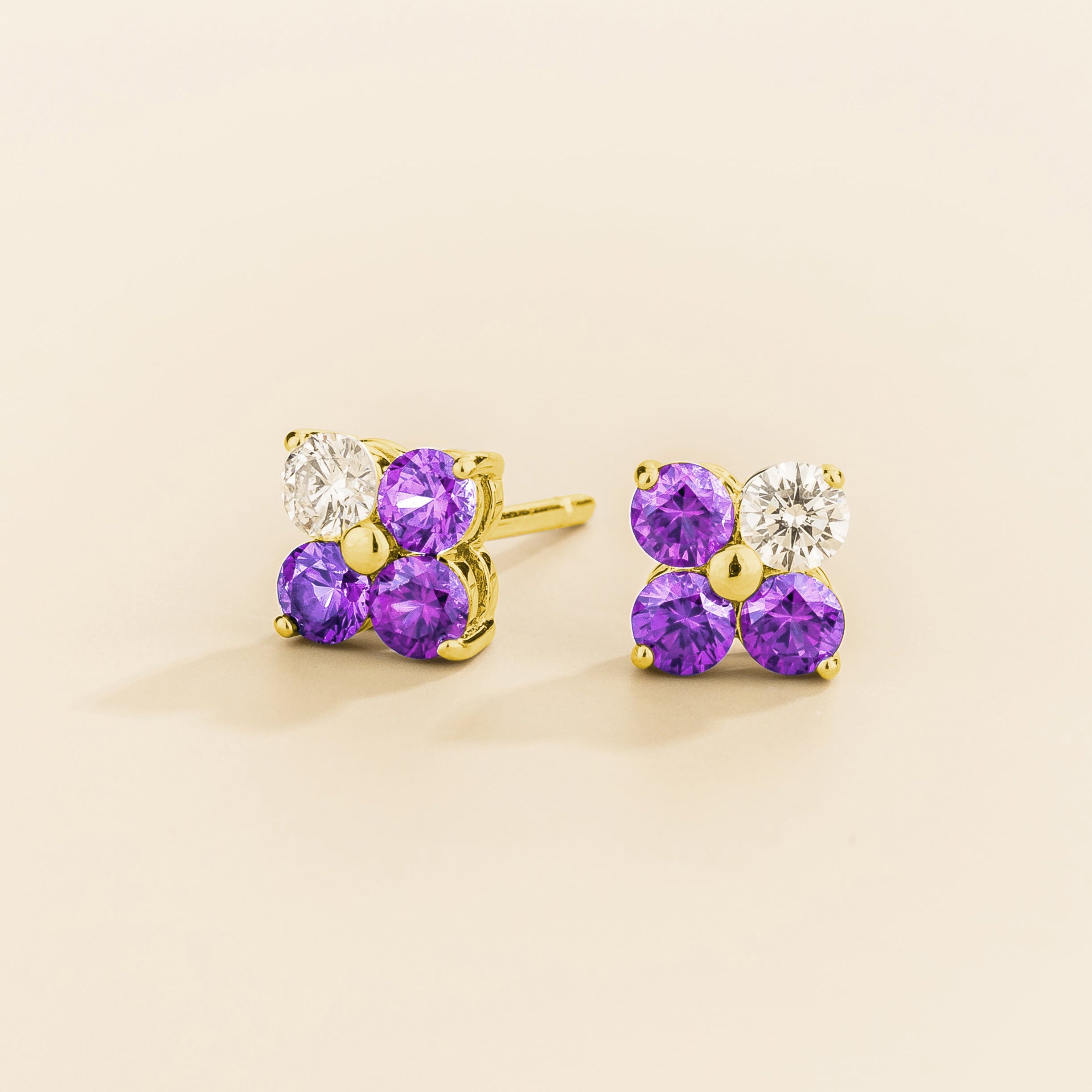 Pair of 4 gemstones purple sapphire and diamond earrings in gold