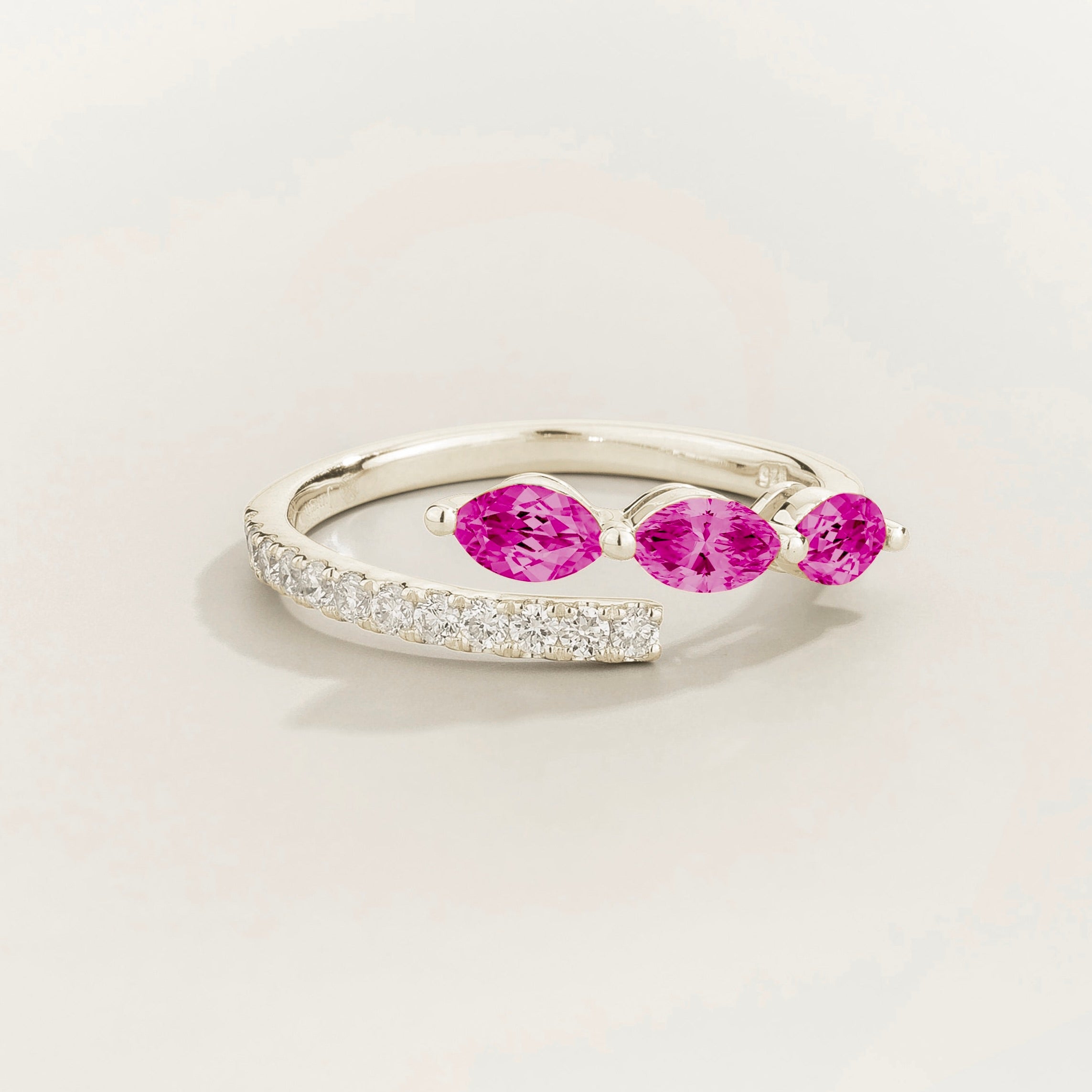 Sava ring in white gold set with dark pink Sapphire and Diamonds.