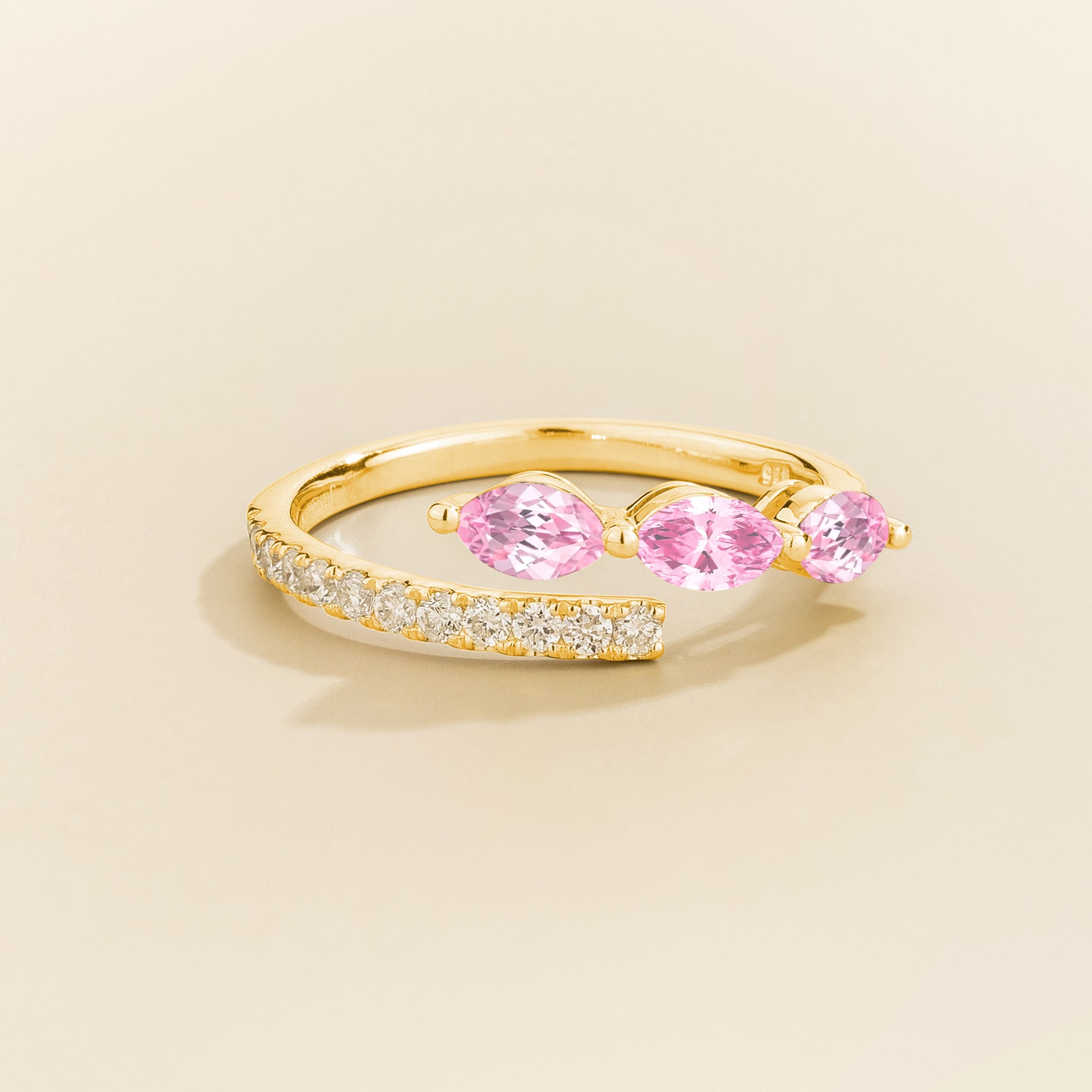 Sava ring in gold set with light pink Sapphire and Diamonds.