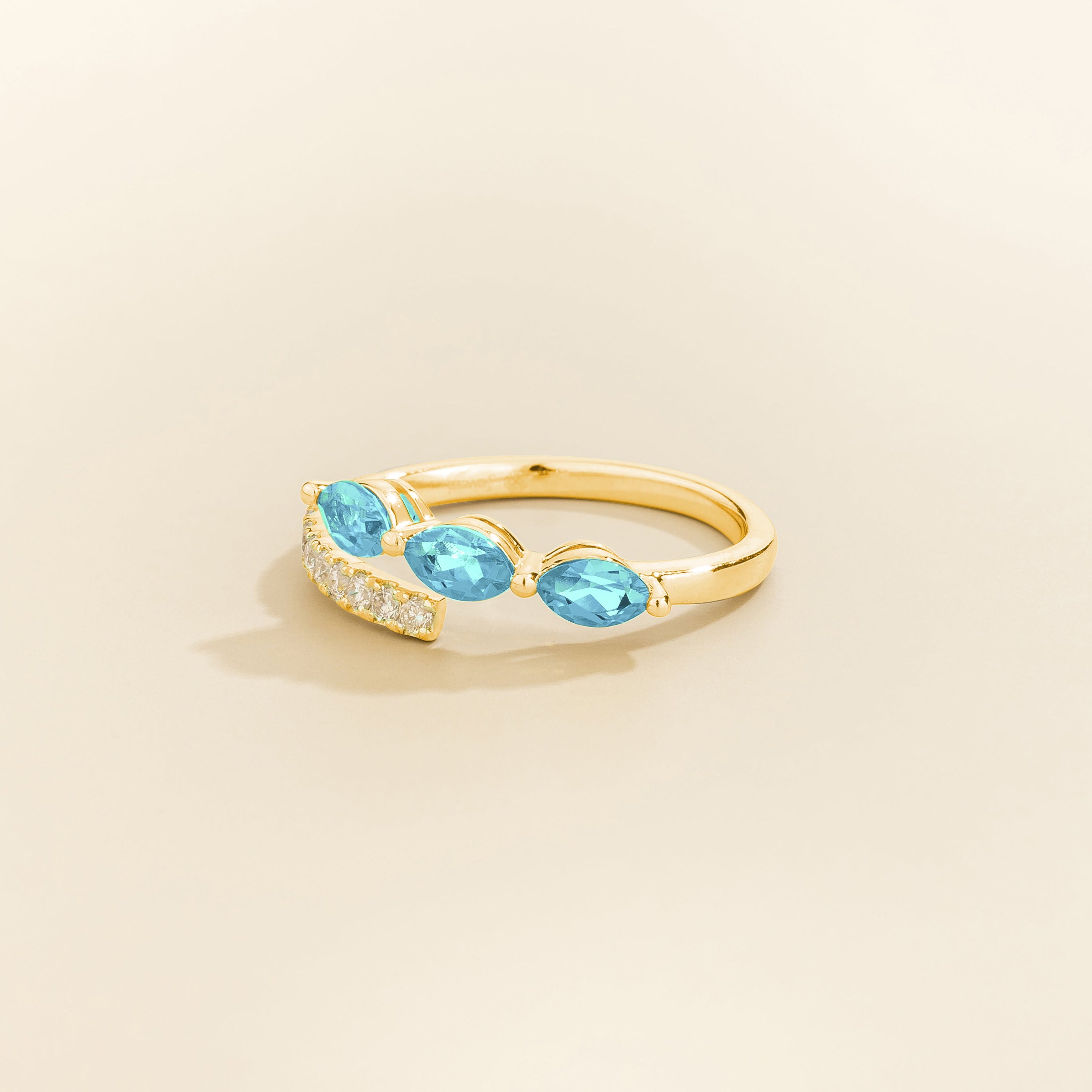Sava ring in gold set with Aquamarine and Diamonds.
