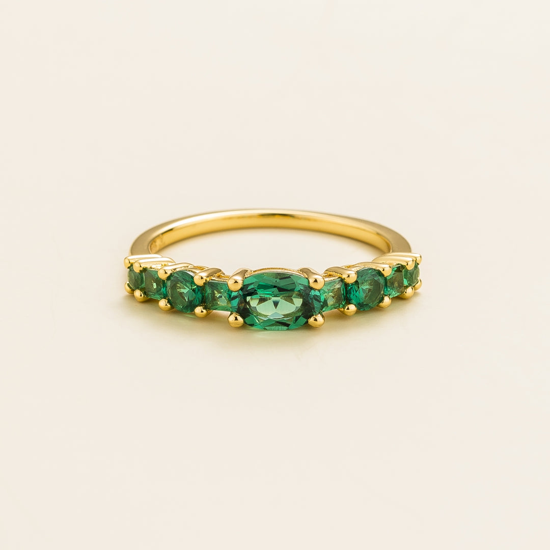 Petra gold ring set with Emerald