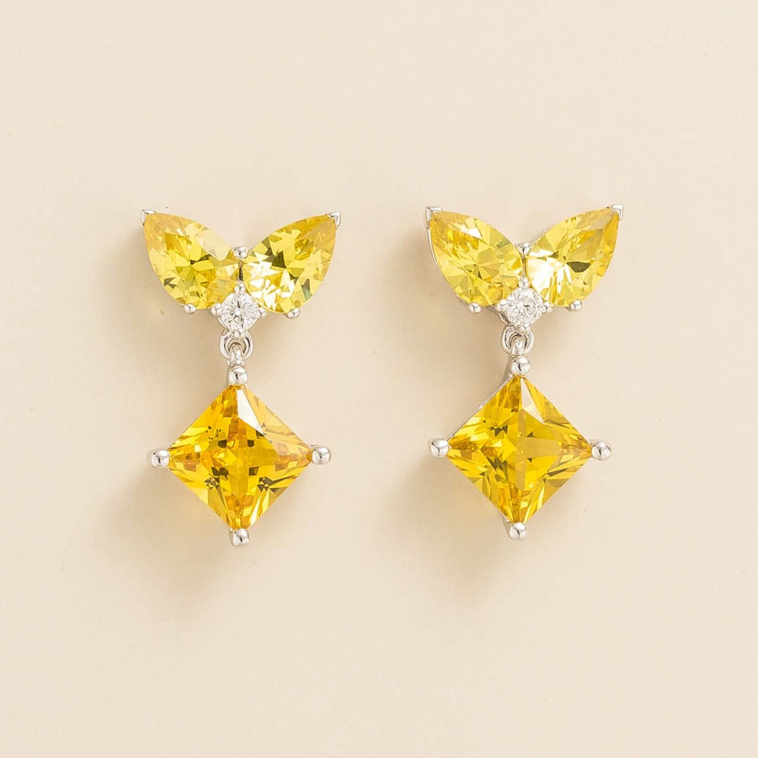 Amore earrings in Yellow sapphire and Diamond set in White gold