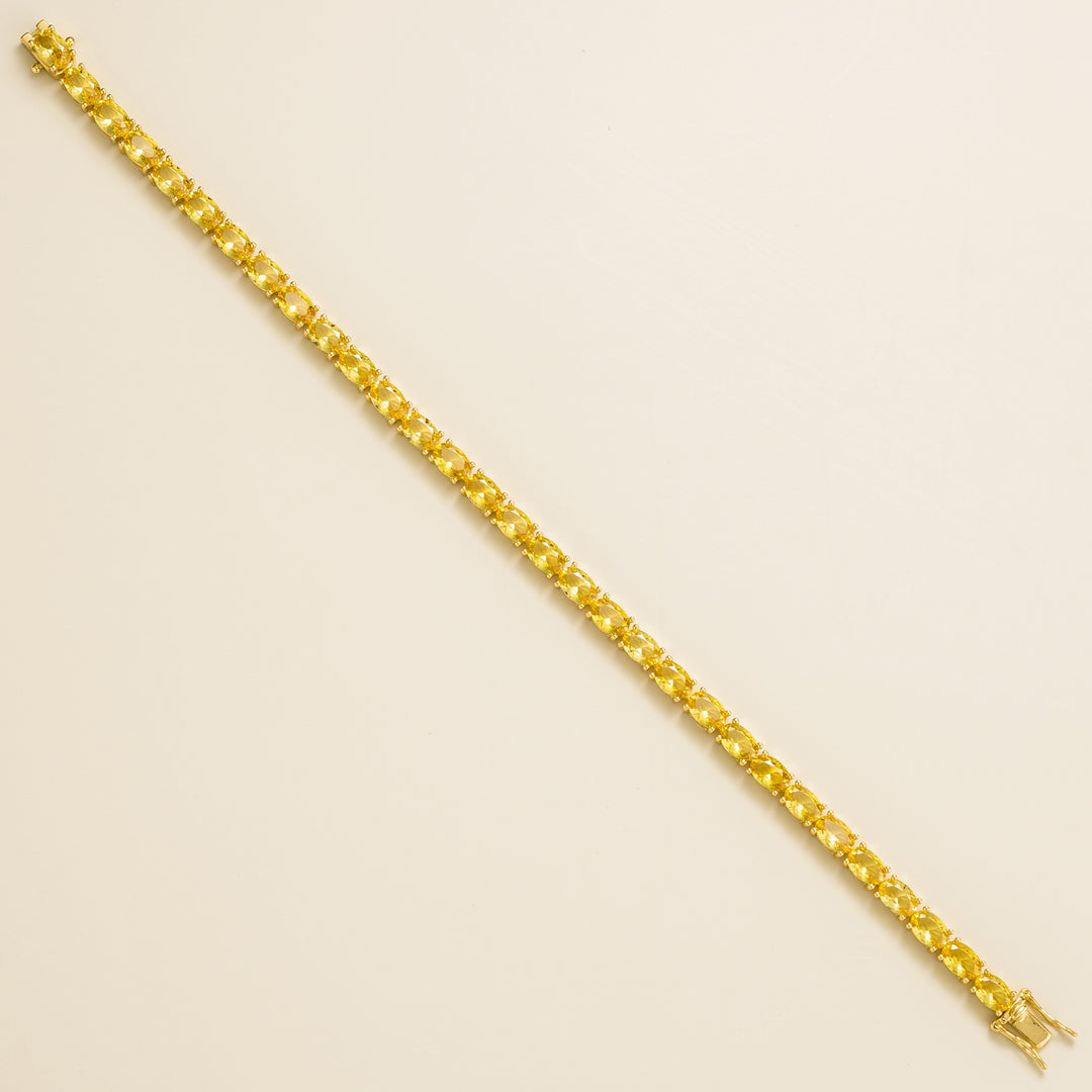 Salto gold tennis bracelet set with Yellow sapphire
