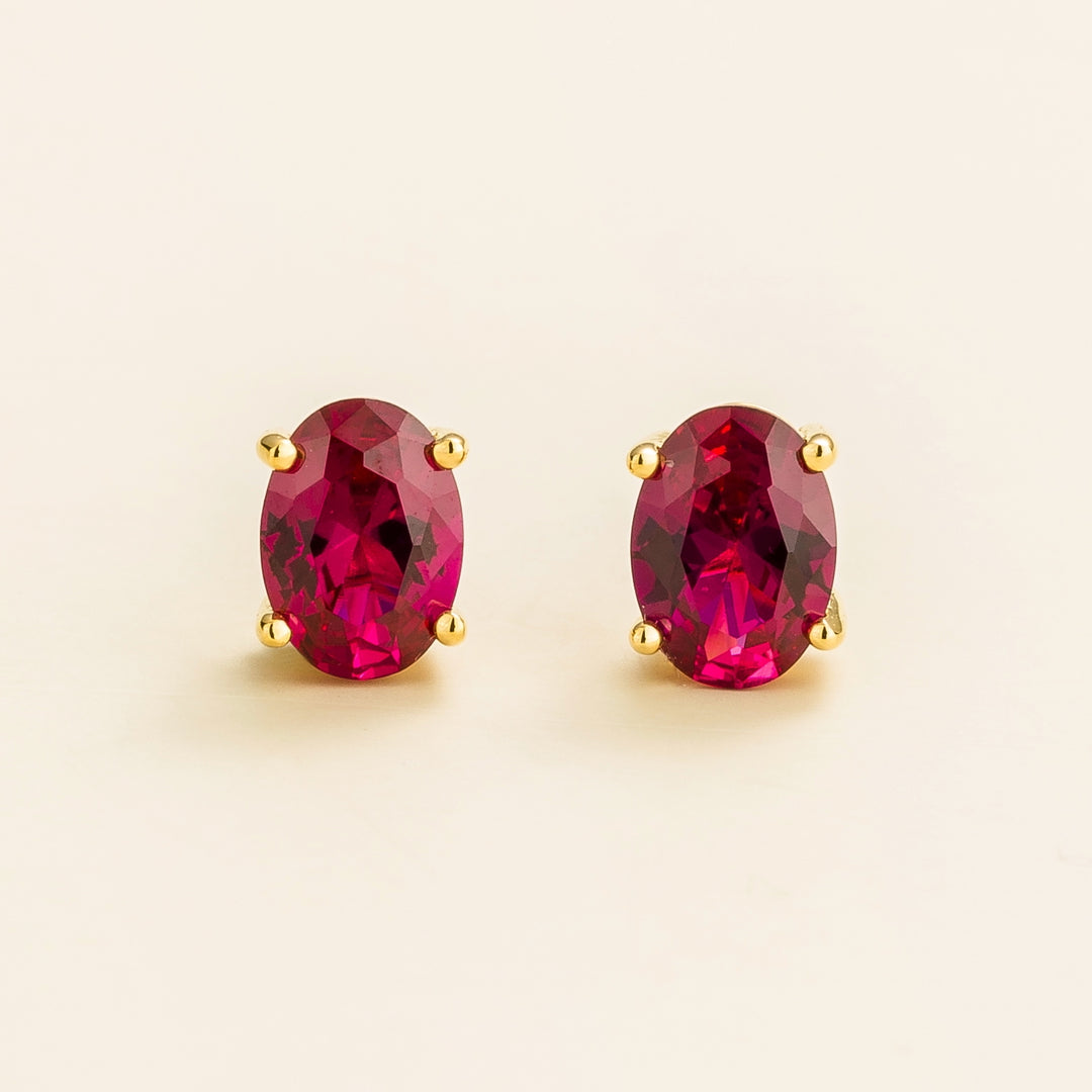 Ova gold earrings set with Ruby