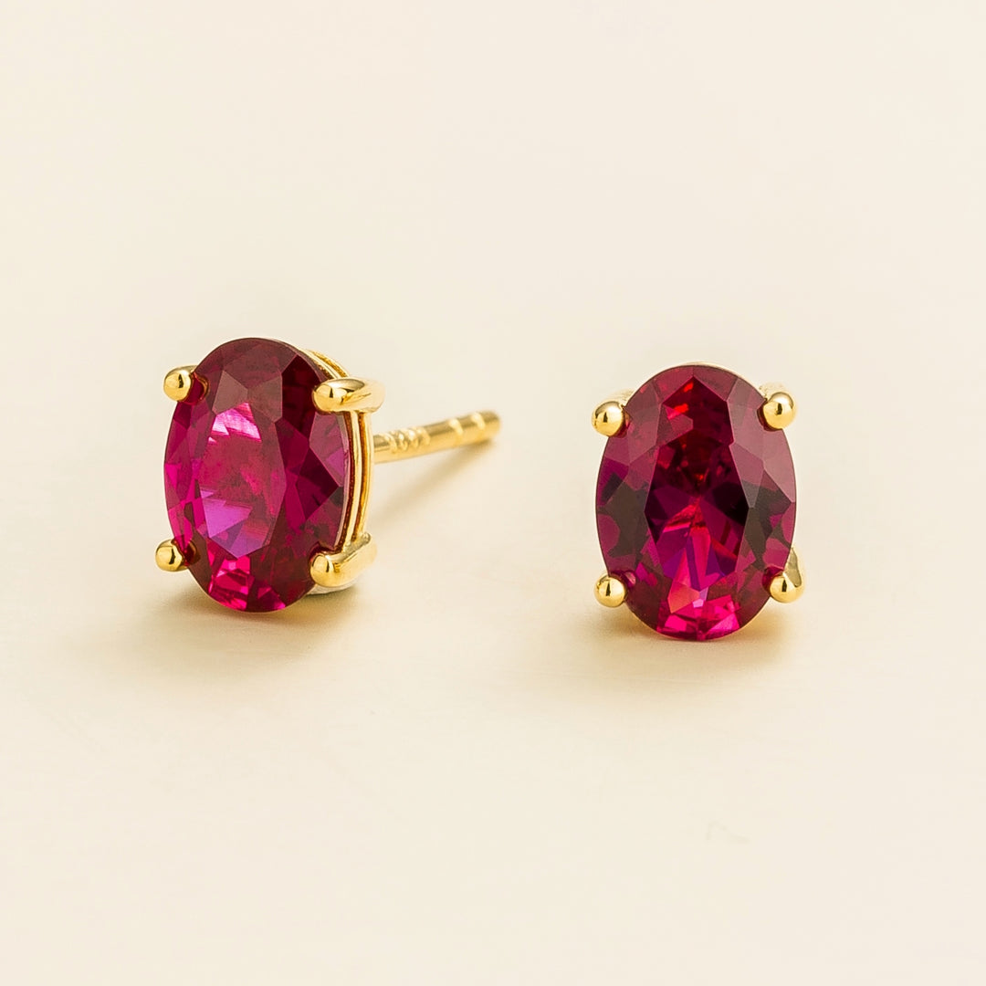 Ova gold earrings set with Ruby