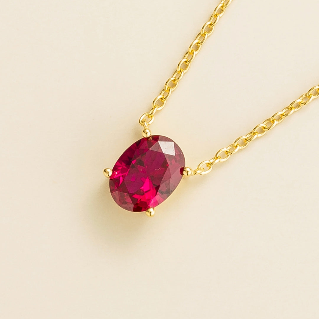 Ova gold necklace set with Ruby
