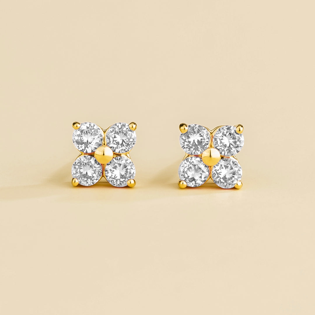 Petale gold earrings set with Diamond