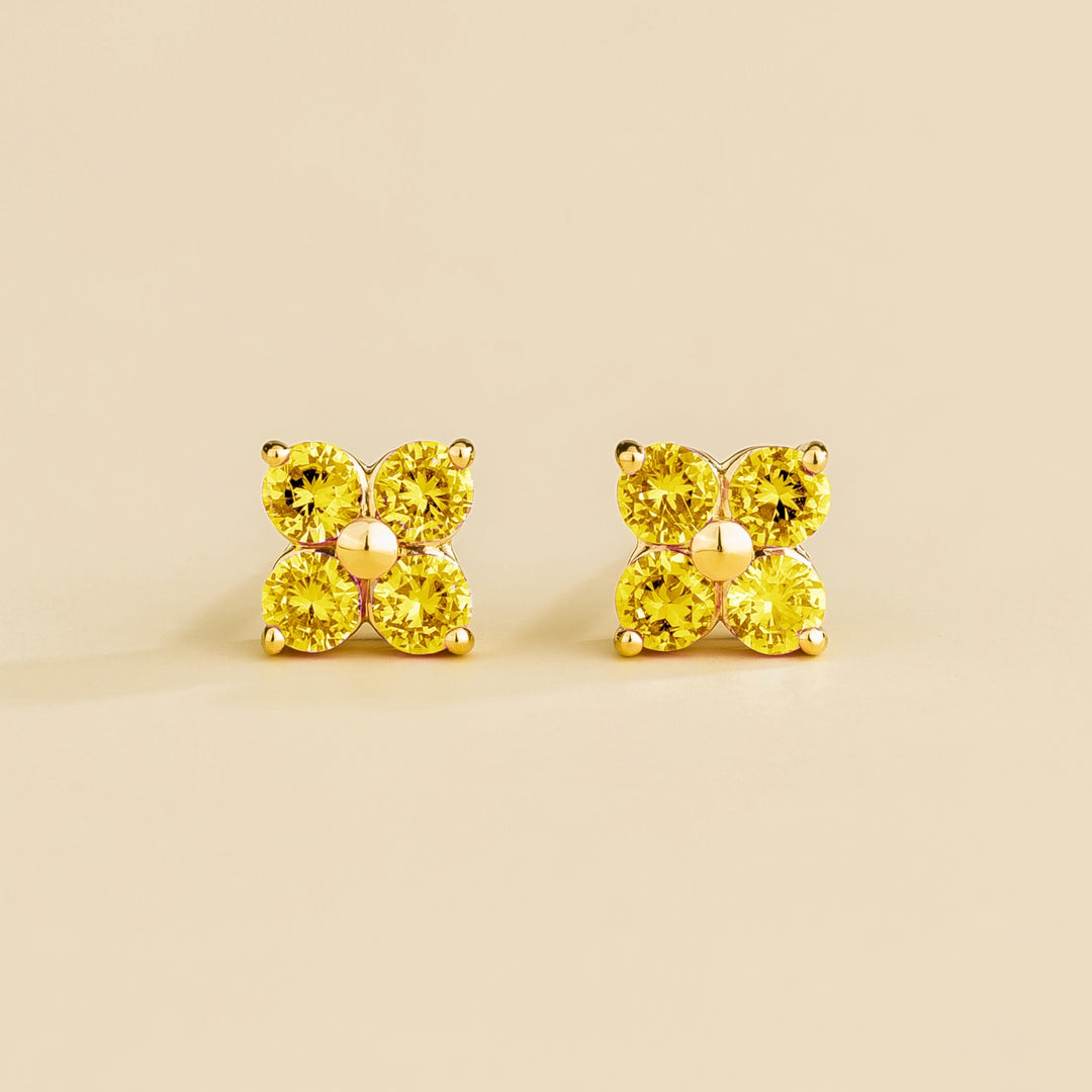 Petale gold earrings set with Yellow sapphires