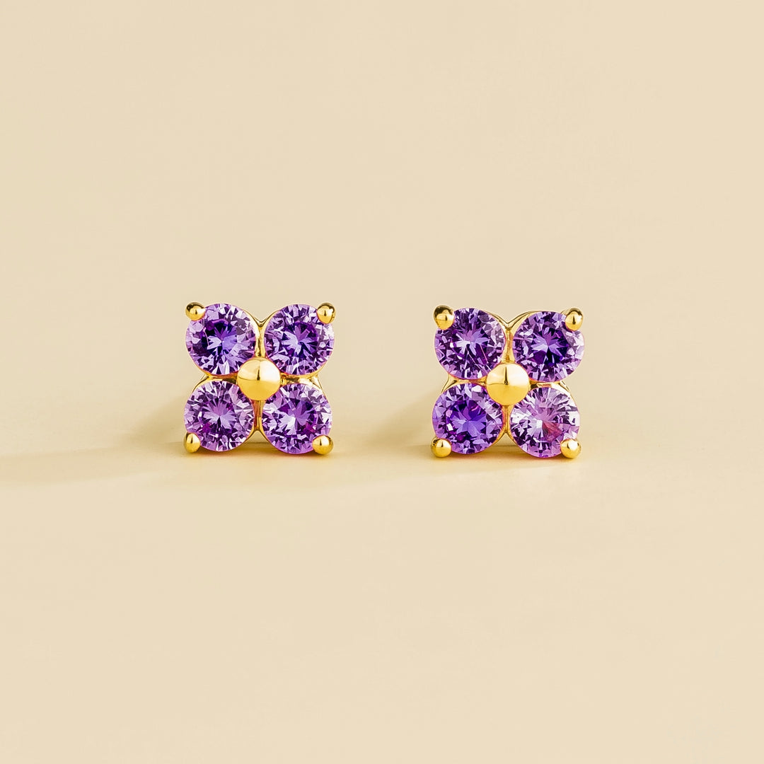 Petale gold earrings set with Purple sapphires