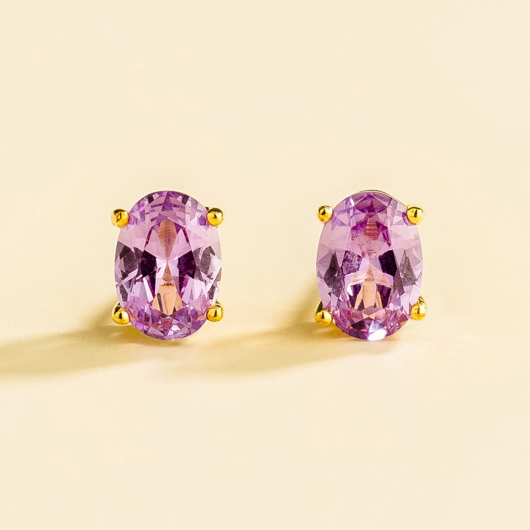 Ova gold earrings set with Purple sapphire