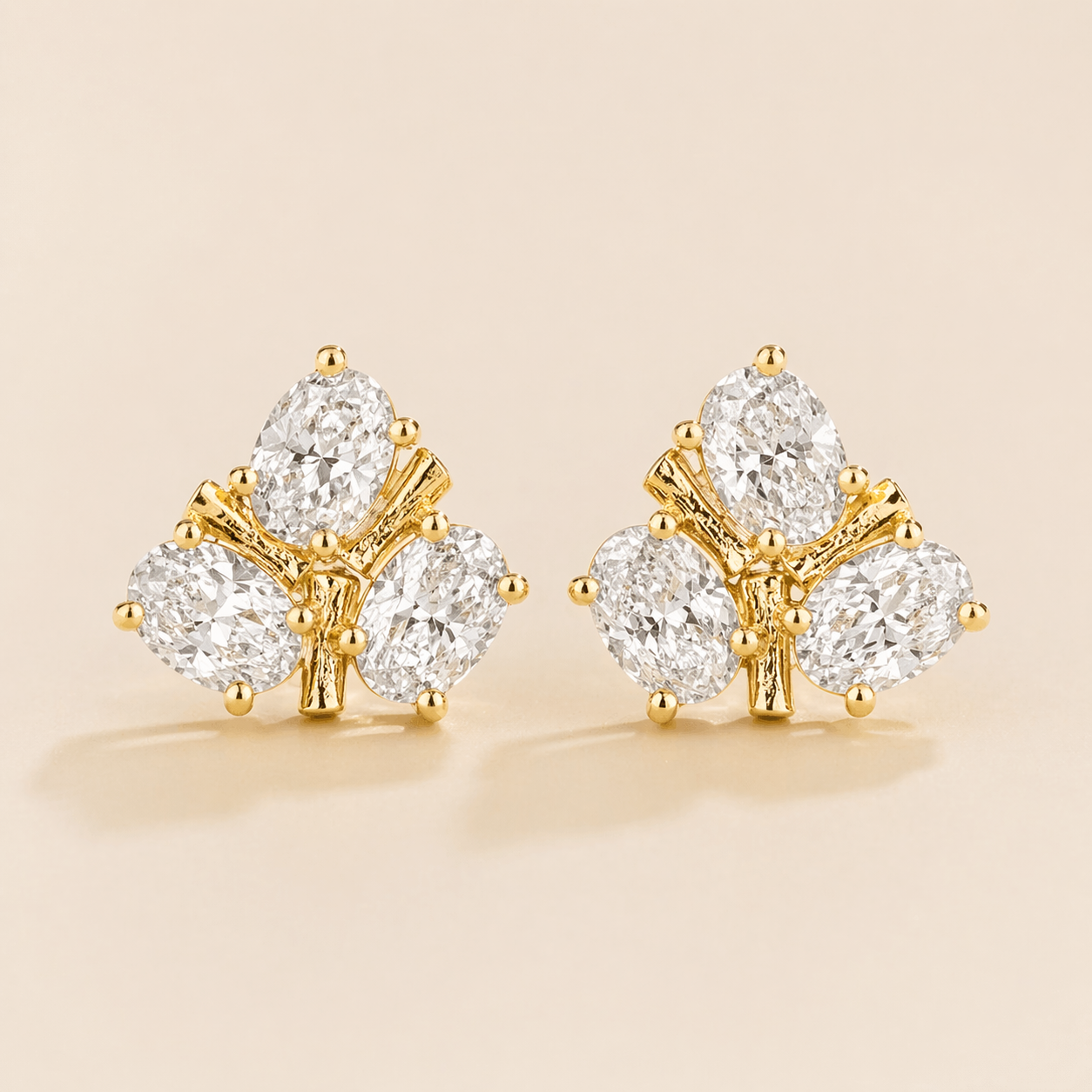 Ligna Oval Diamond Cluster Stud Earrings in Gold