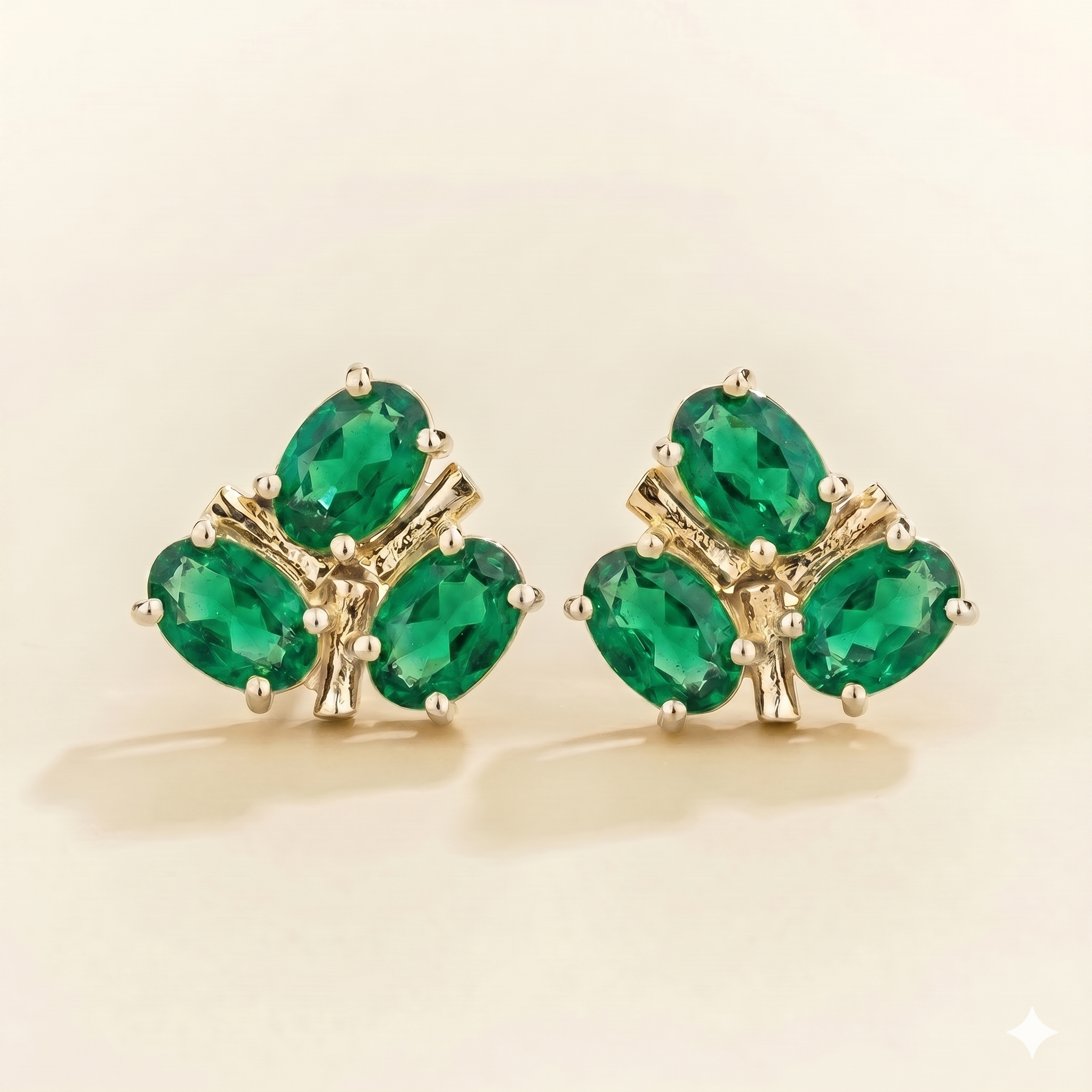 Ligna Oval Emerald Cluster Stud Earrings in White Gold