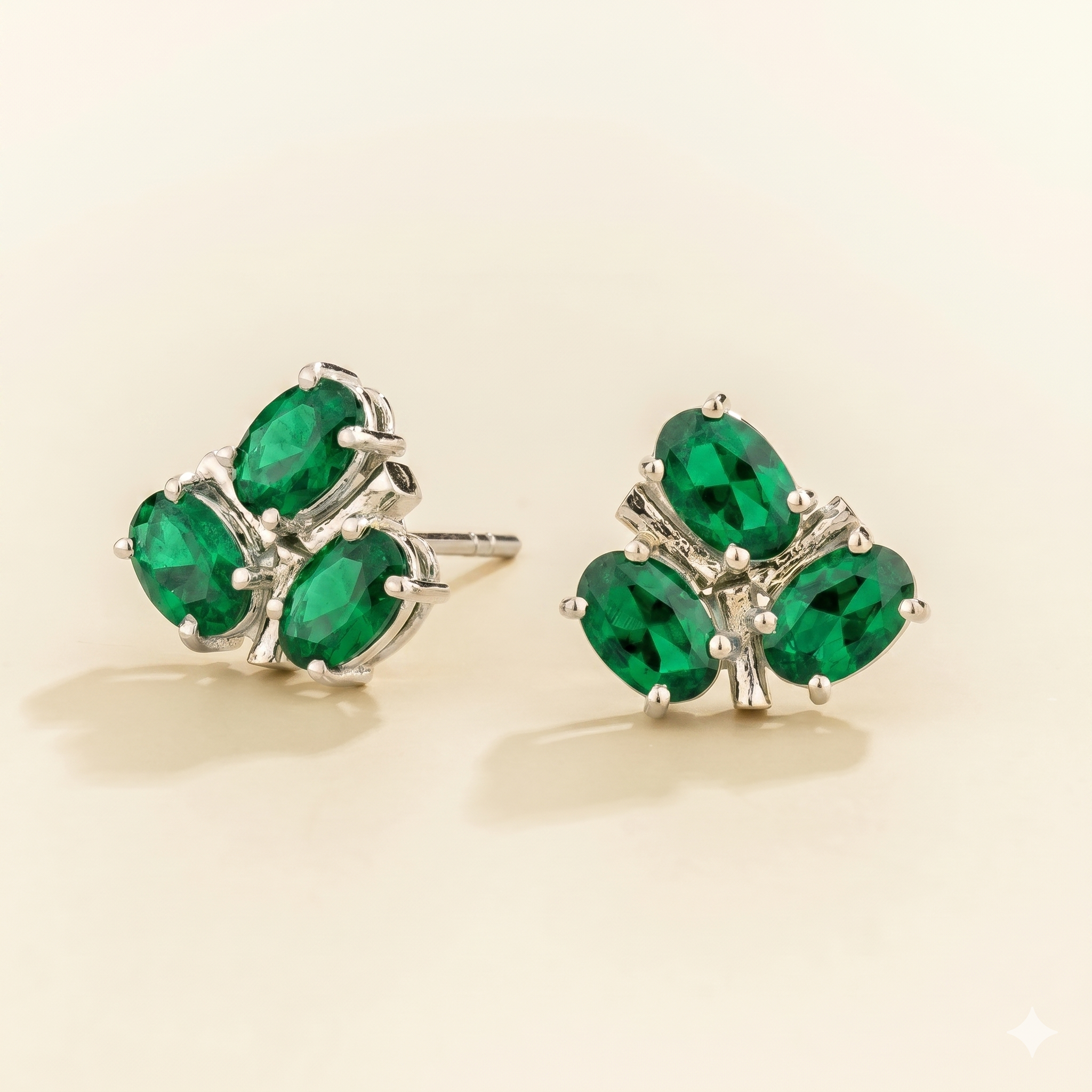 Ligna Oval Emerald Cluster Stud Earrings in White Gold
