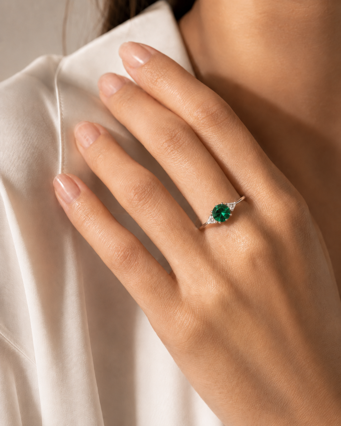 Lola Round Emerald Three-Stone Ring with Trillion Diamonds in White Gold
