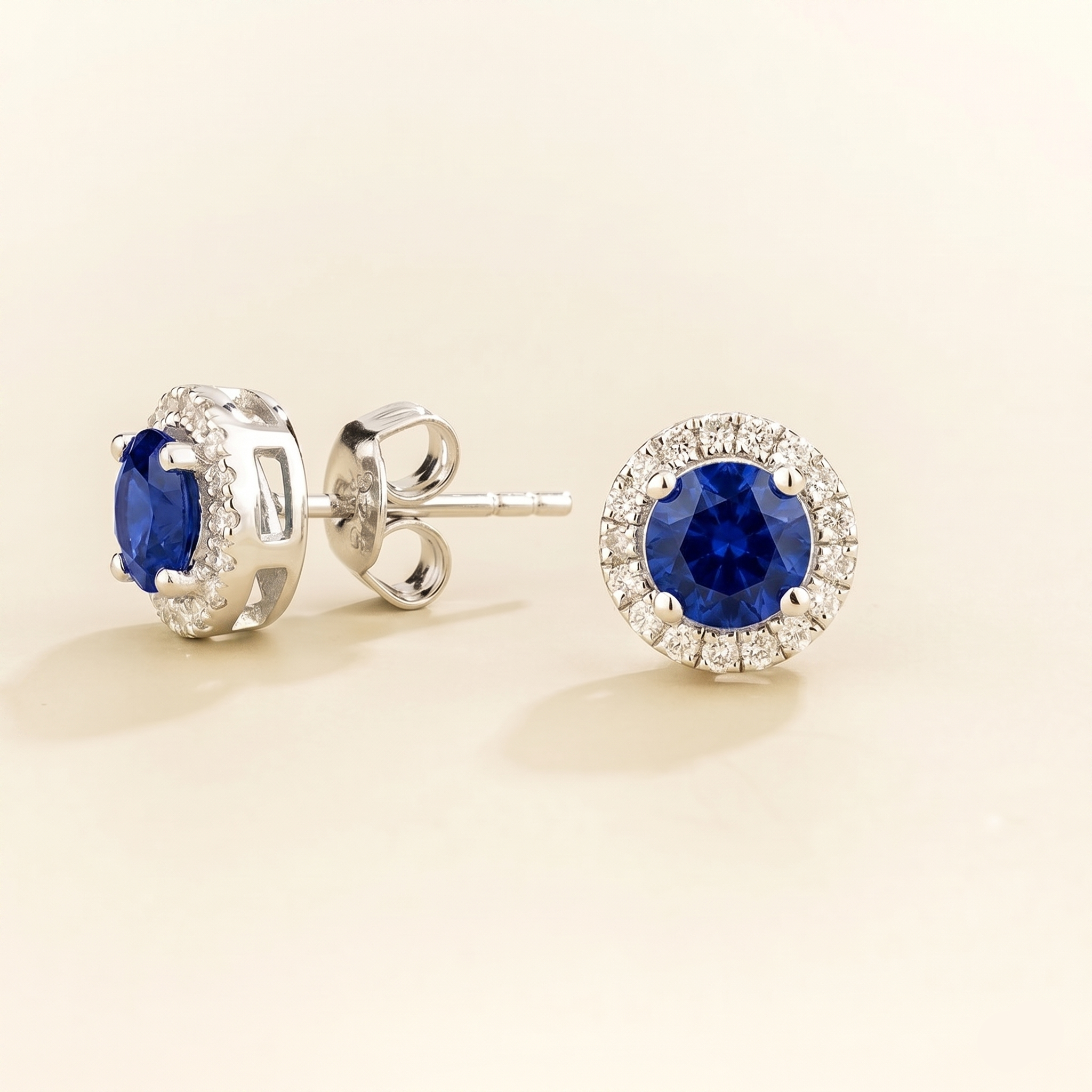 Mars Blue Sapphire Round & Diamond Halo Earrings In White Gold