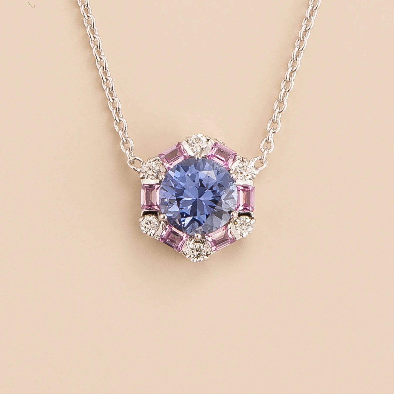Melba hexagon necklace in 18K white gold vermeil set with lab grown Ceylon blue sapphire, Pink sapphire and Diamond gem stones.