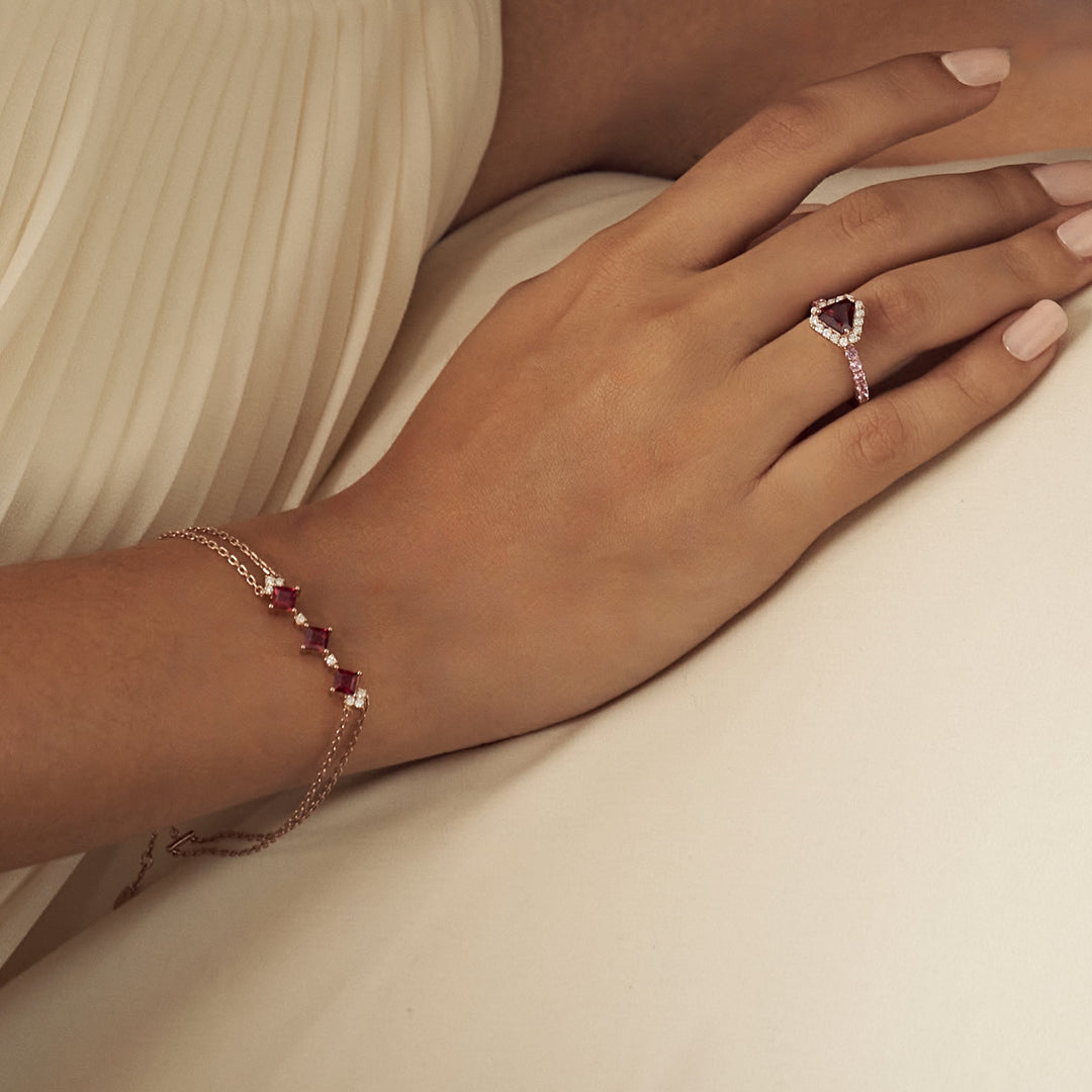 A model wearing Forma bracelet and Diana ring set with lab grown ruby, diamond and pink sapphire.