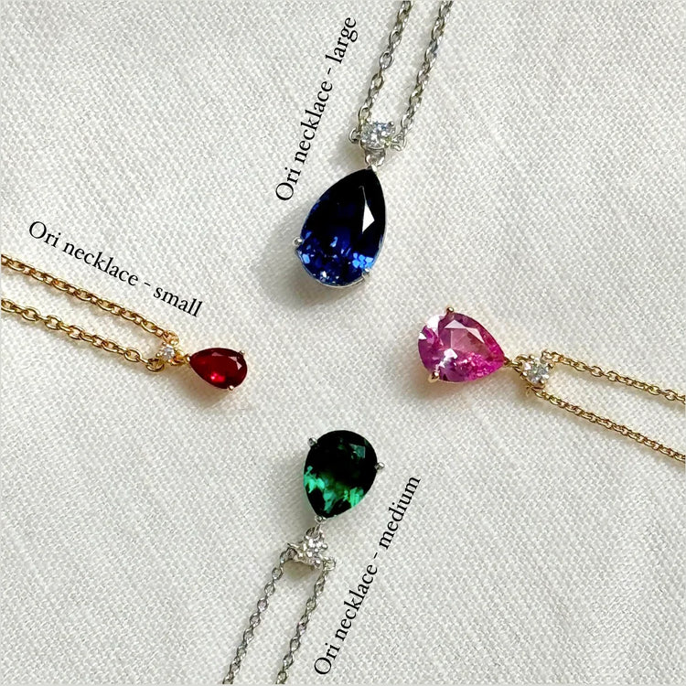 Ori Medium Pendant Necklace In Purple Sapphire and Diamond Set In Gold By Bespoke Jewellery London UK
