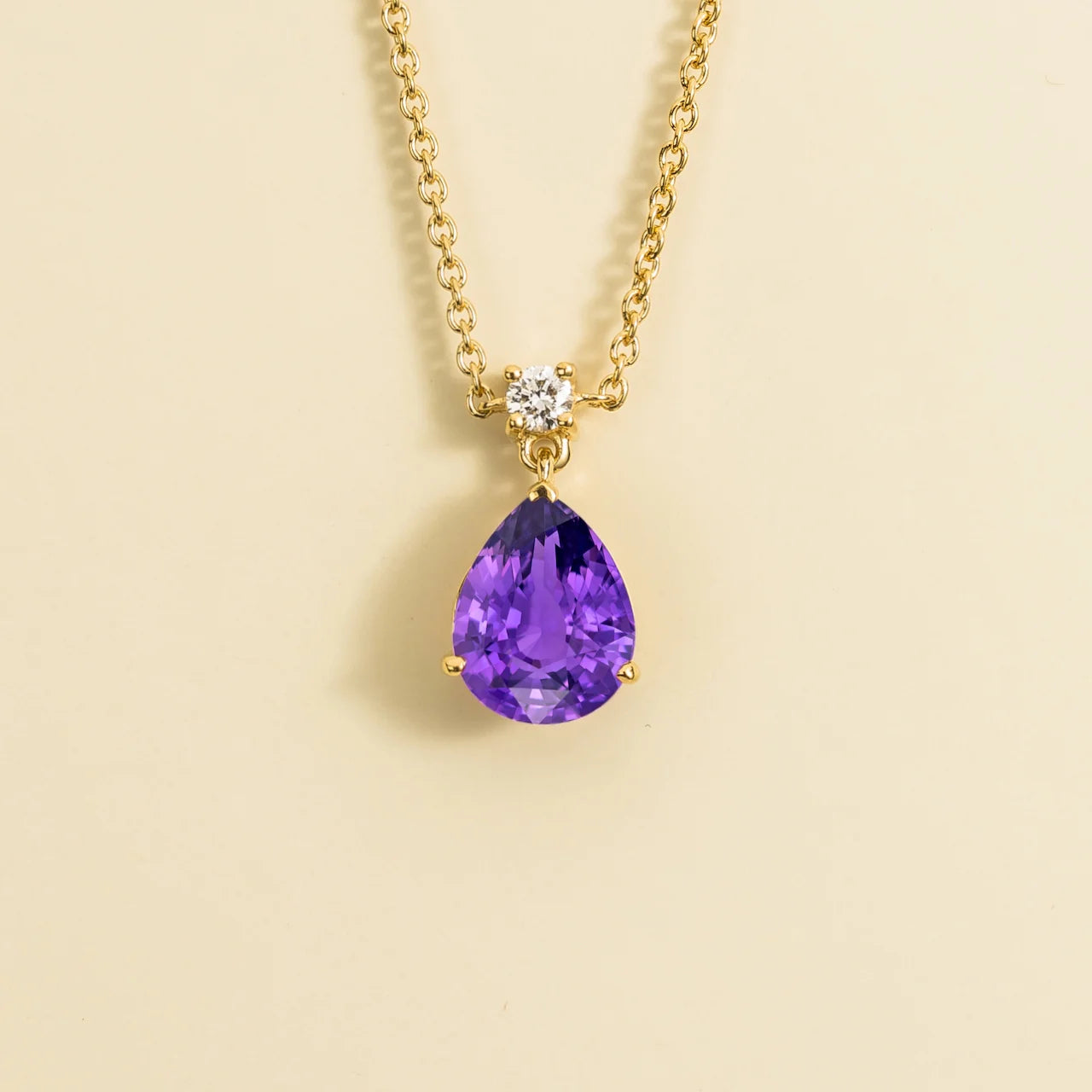 Ori Medium Pendant Necklace In Purple Sapphire and Diamond Set In Gold By Bespoke Jewellery London