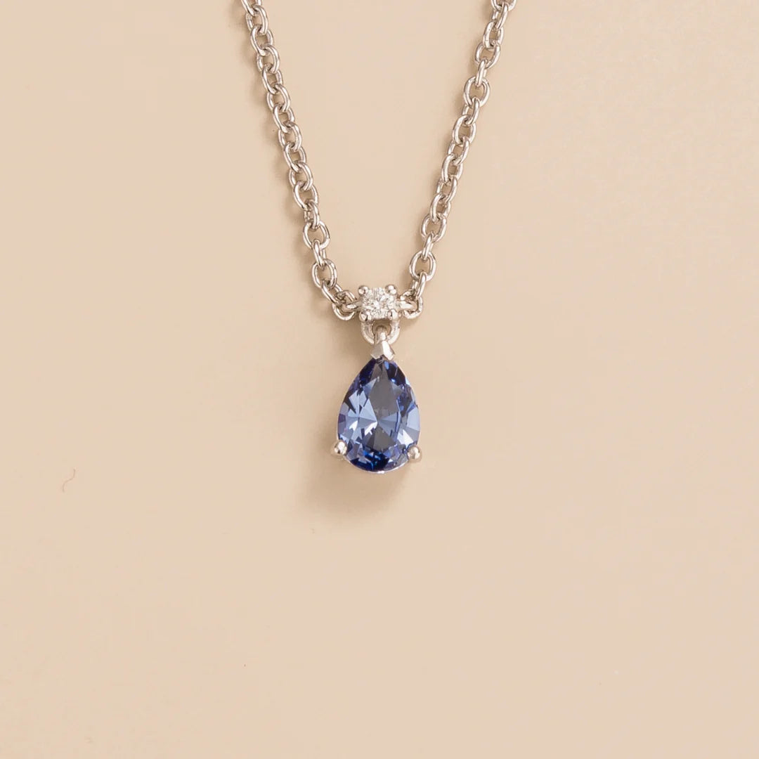 Ori pear drop necklace in 18K white gold vermeil set with lab grown Ceylon blue sapphire and Diamond gem stones.