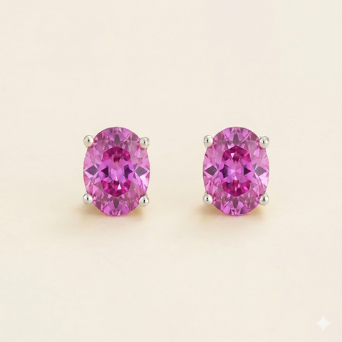 Ovo Vivid Pink Sapphire Oval Stud Earrings in White Gold Ovo Vivid Pink Sapphire Oval Stud Earrings in White Gold