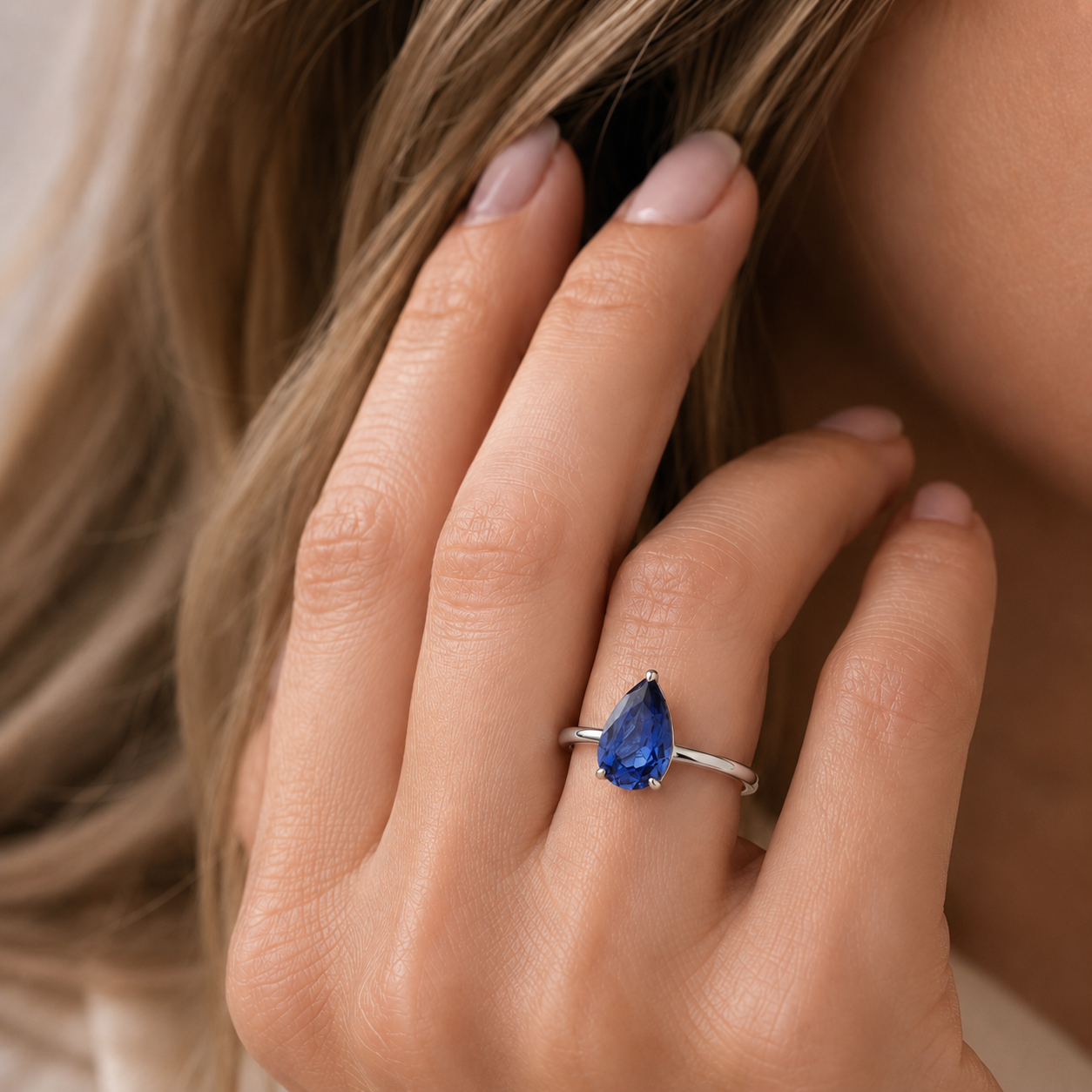 Pandal Pear Shape Blue Sapphire Cathedral Solitaire Ring in White Gold
