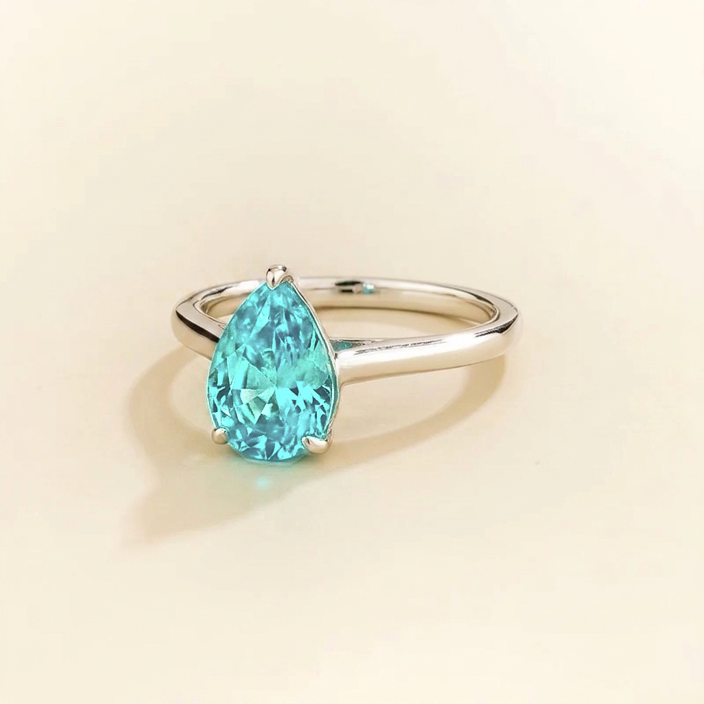 Pandal Pear Shape Paraiba Sapphire Cathedral Solitaire Ring in white gold