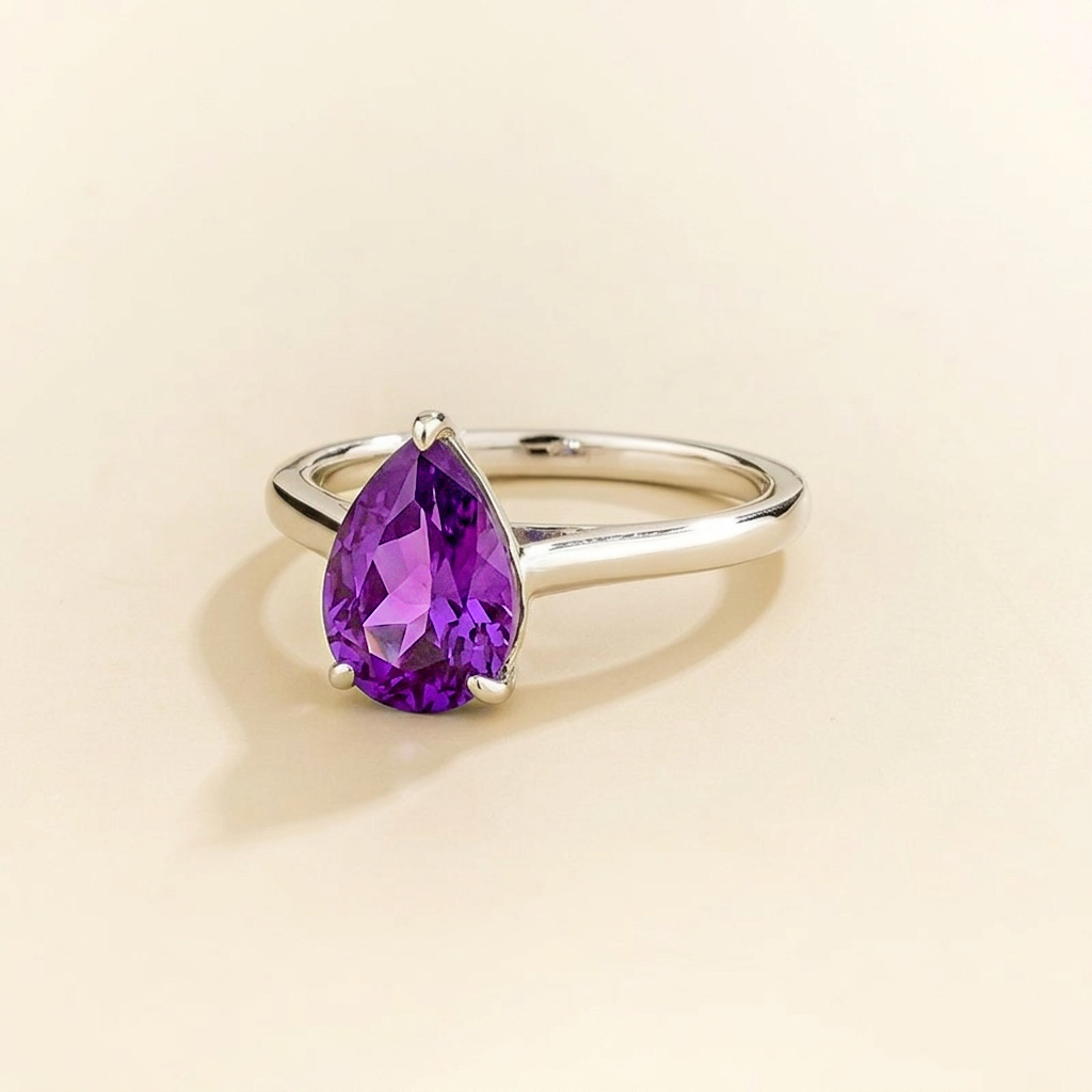 Pear Shape Purple Sapphire Cathedral Solitaire Ring in White Gold