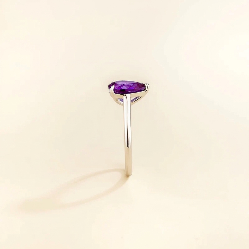 Pear Shape Purple Sapphire Cathedral Solitaire Ring in White Gold
