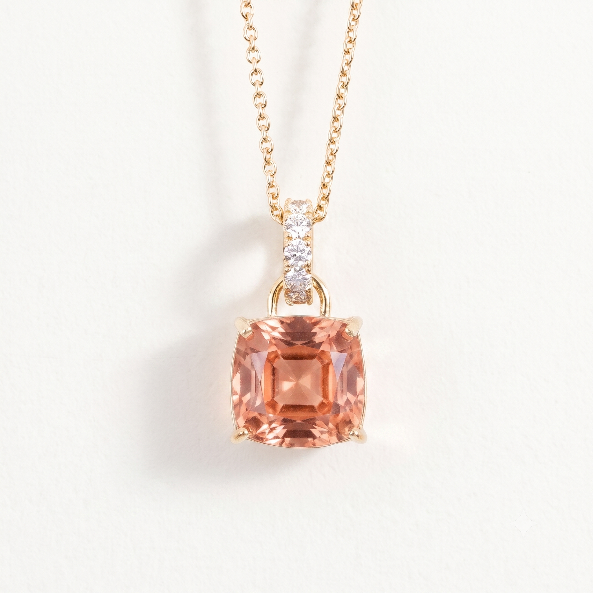 Cushion-cut lab-grown padparadscha sapphire and diamond hoop pendant necklace, Roue design in gold | Juvetti London