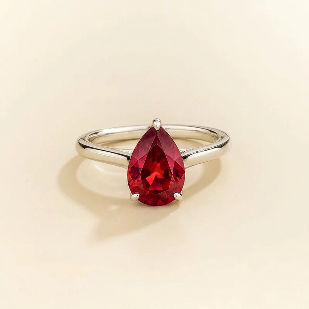 Pandal Pear Shape Ruby Cathedral Solitaire Ring in white gold