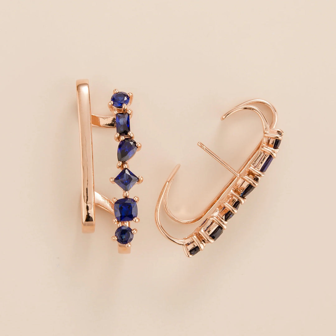 Perfect Jewellery Gift for her. Serene cuff earrings in 18K pink gold vermeil set with 5.46 carats lab grown blue sapphire gem stones.
