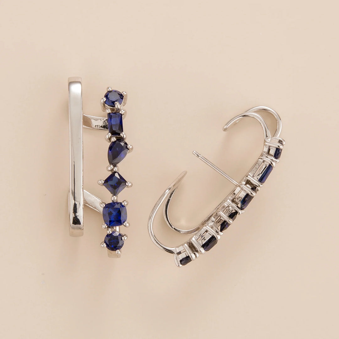 Serene cuff earrings in 18K white gold vermeil set with 5.46 carats lab grown Blue sapphire gem stones. Perfect for yourself and as online jewellery gift with worldwide shipping.