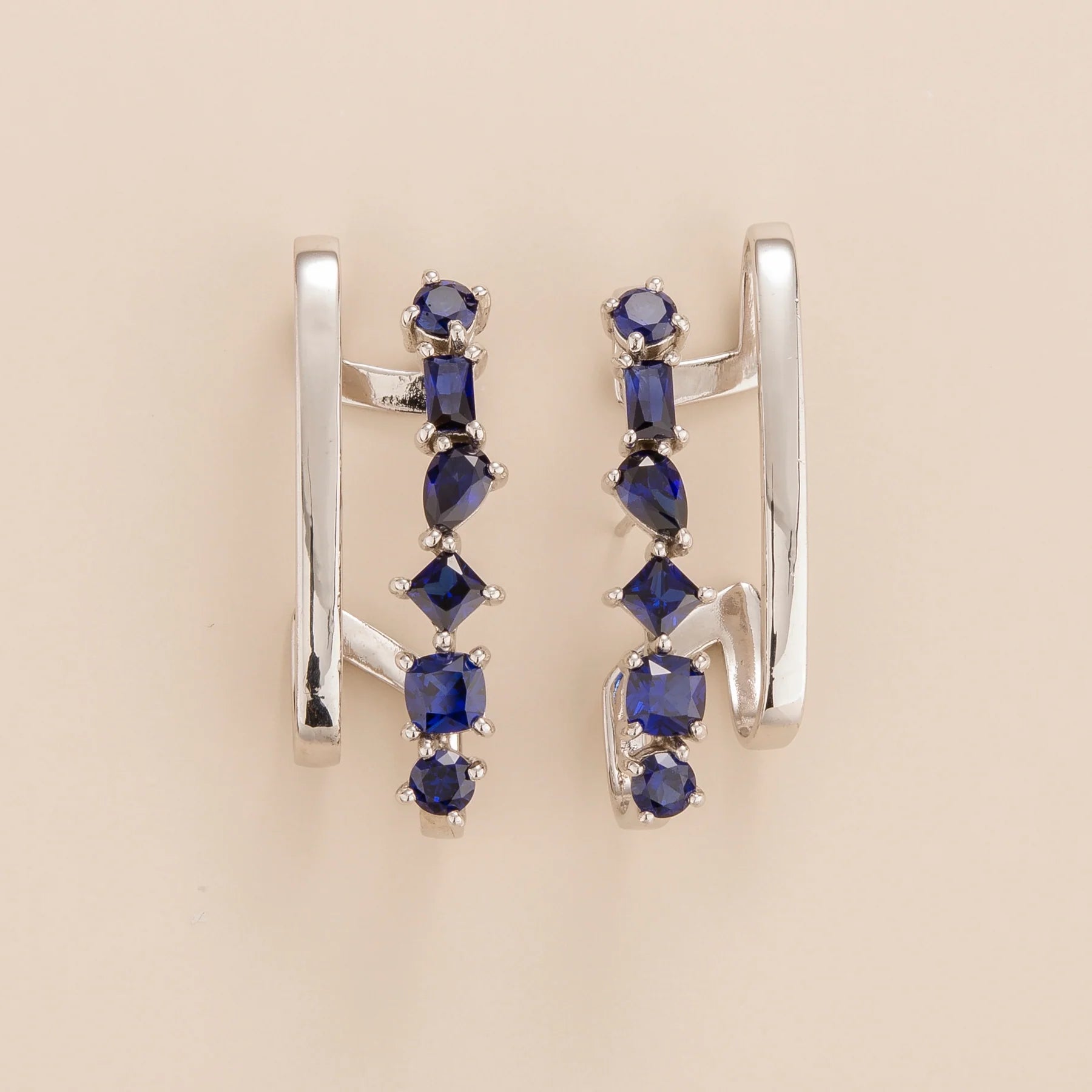Serene White Gold Earrings Set With Blue Sapphire Bespoke Jewellery Juvetti London
