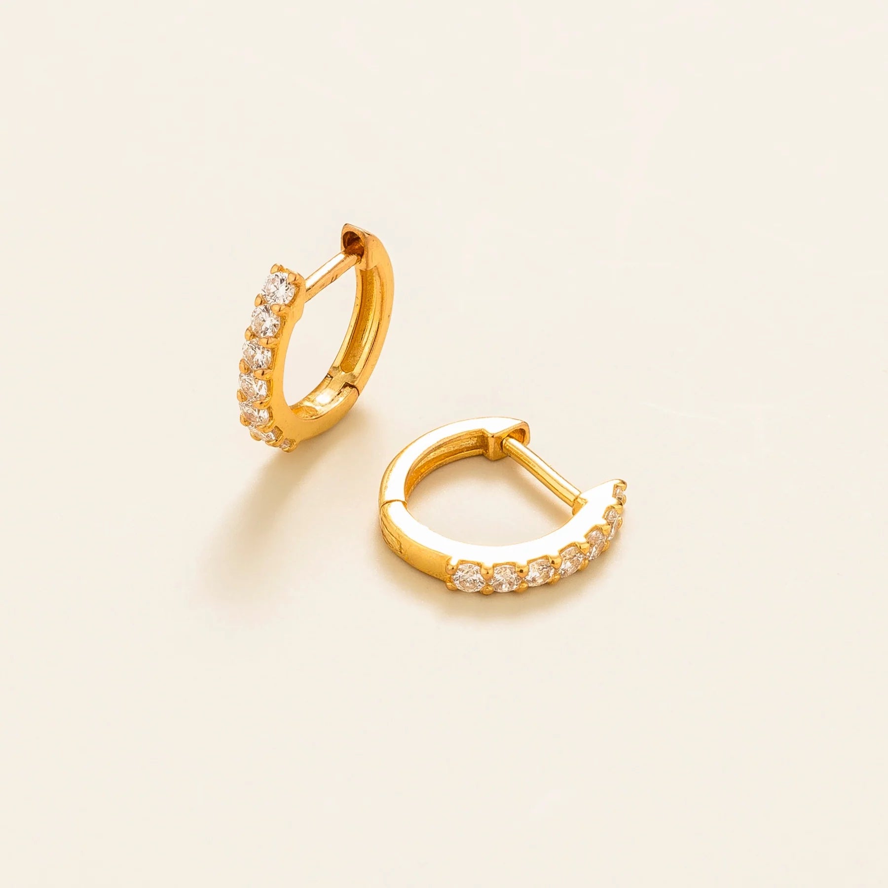 Stacy gold huggie earrings set with Diamond Bespoke Jewellery From London